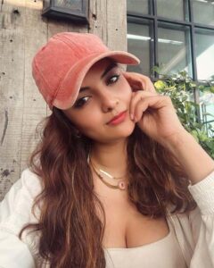Beautiful Indian bhabhi Anveshi Jain in pink cap casual look