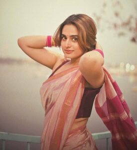 Ayesha Khan in pink saree looking gorgeous near riverside