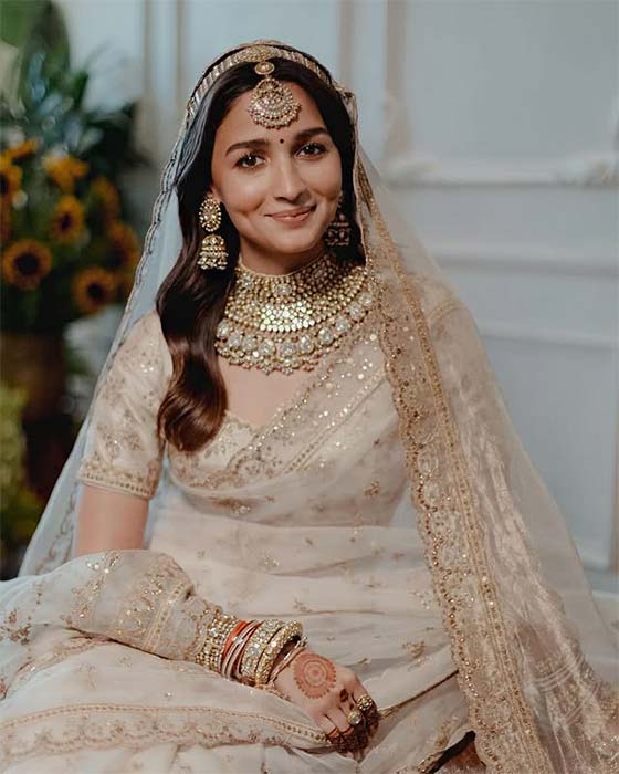Alia Bhatt in ivory-golden embroidered saree on her wedding day